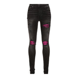 Amiri MX1 Cracked Leather Denim Jeans “Black/Pink”